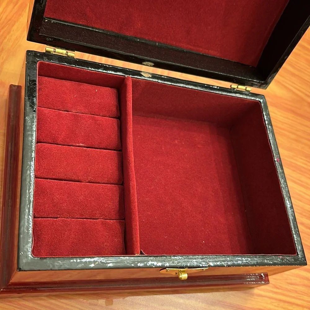 Vintage lacquer jewelry box with angels depicted